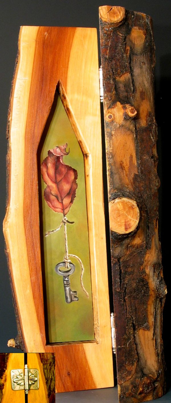 10.019 Leaf and Key Log House 4.75×12.5"